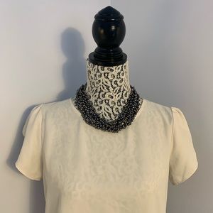 Short beaded necklace blues and purples